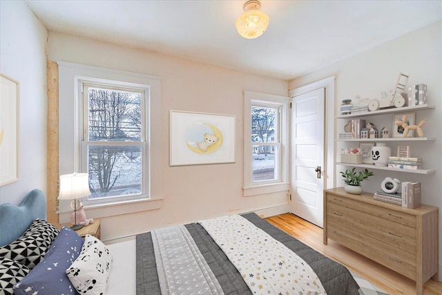 bedroom with light wood-style flooring