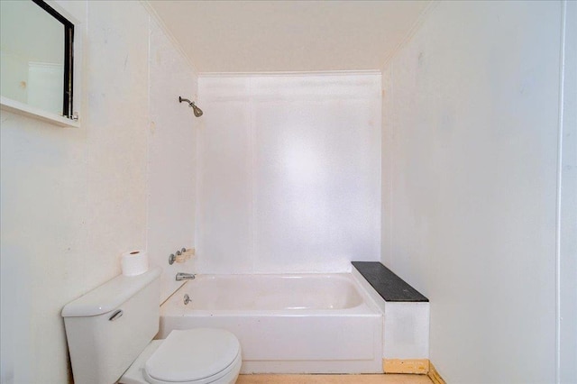 bathroom with toilet and shower / bathtub combination