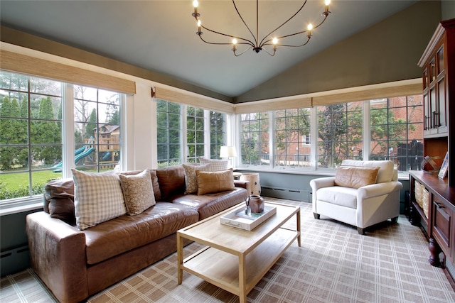 sunroom with plenty of natural light, a baseboard radiator, vaulted ceiling, and a notable chandelier