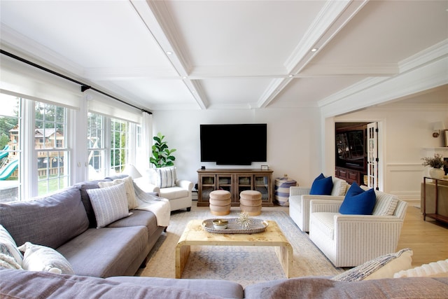 living room with light wood-type flooring, coffered ceiling, beam ceiling, and crown molding