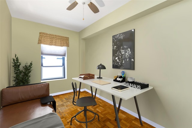 office with ceiling fan and baseboards