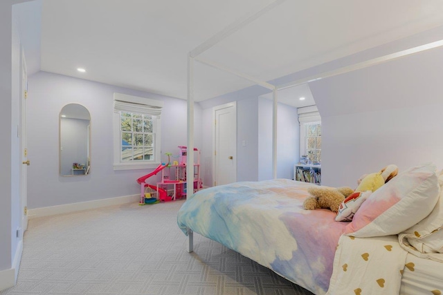 bedroom featuring multiple windows, recessed lighting, and carpet floors