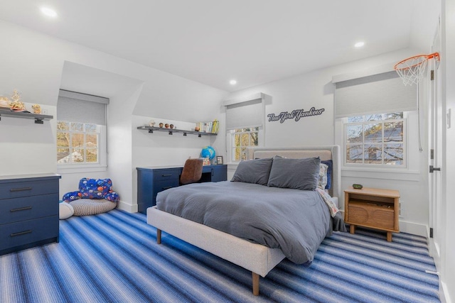 carpeted bedroom featuring recessed lighting and baseboards