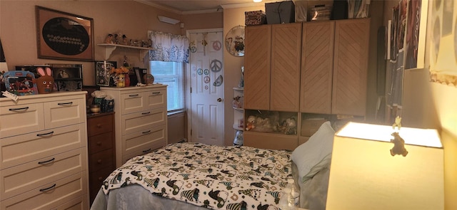 bedroom with crown molding