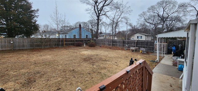 view of yard with a fenced backyard