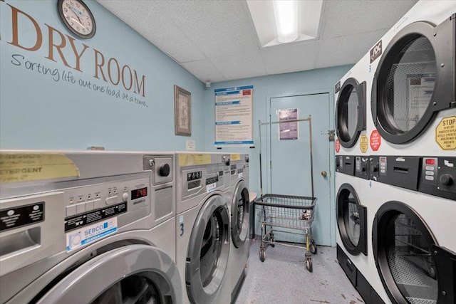 community laundry room with stacked washer / dryer and washer and clothes dryer