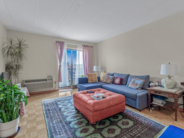 living area featuring a textured ceiling