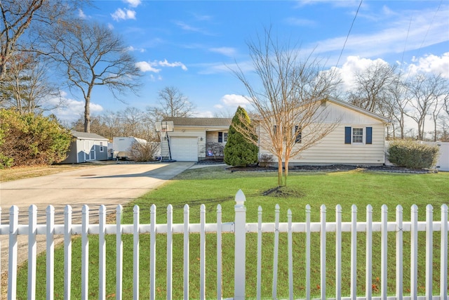 view of front of property with a garage, a fenced front yard, concrete driveway, and a front yard