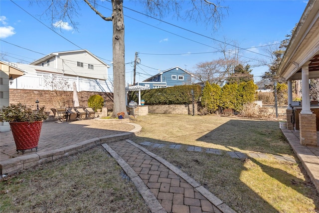 view of yard featuring a patio area and fence