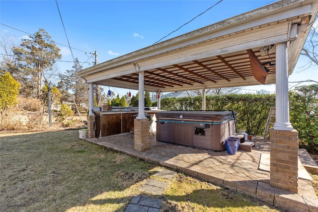 exterior space with a hot tub