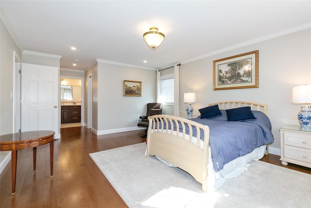 bedroom featuring connected bathroom, recessed lighting, baseboards, ornamental molding, and dark wood-style floors