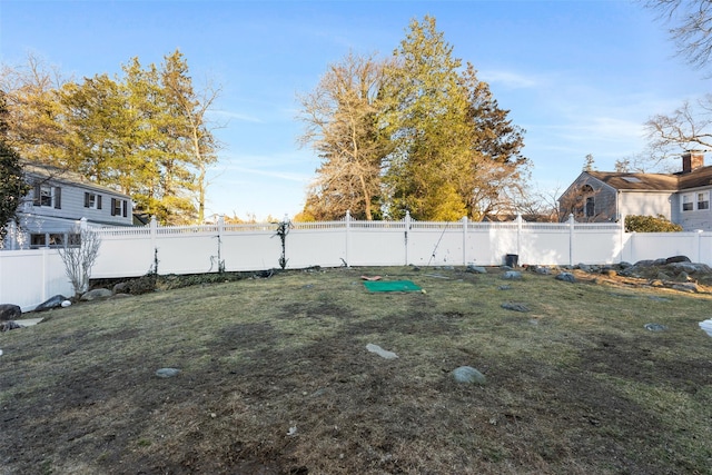 view of yard featuring a fenced backyard