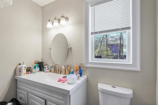 half bath with toilet and vanity