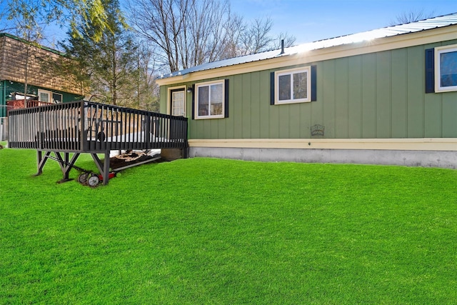 view of yard featuring a deck