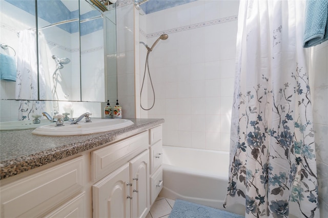 bathroom with shower / bath combination with curtain and vanity