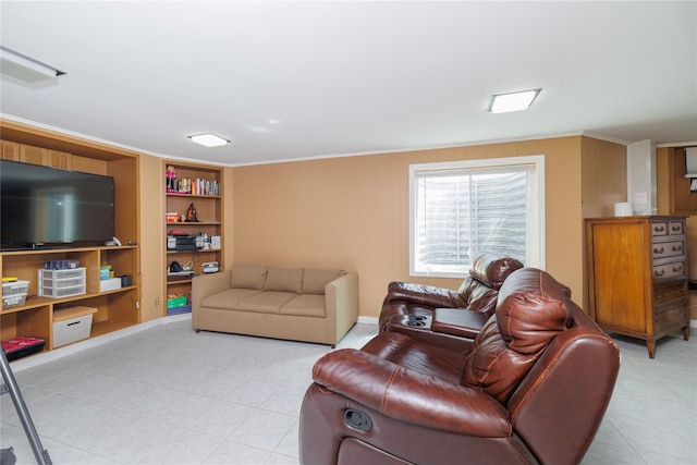 living room with light tile patterned floors, ornamental molding, and built in features