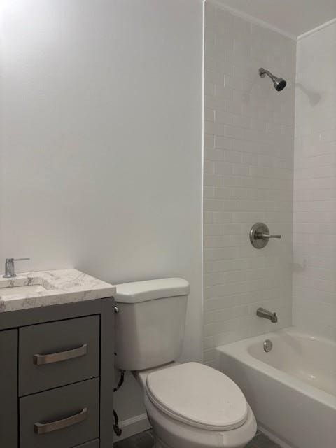 full bathroom with shower / bath combination, vanity, and toilet