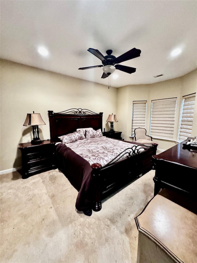 bedroom with ceiling fan, recessed lighting, carpet flooring, visible vents, and baseboards