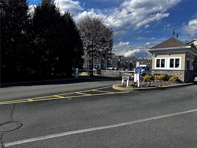 view of street with curbs