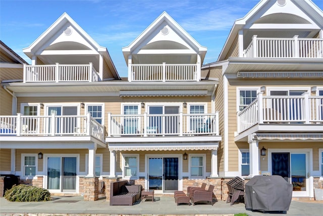 exterior space with a patio area and outdoor lounge area