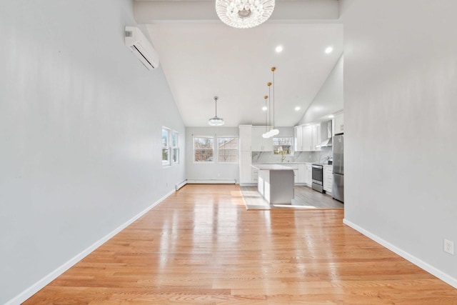 unfurnished living room featuring baseboards, a wall unit AC, a baseboard radiator, light wood-style floors, and high vaulted ceiling