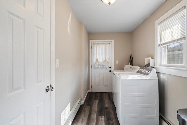 laundry area featuring laundry area, a baseboard radiator, dark wood-type flooring, and independent washer and dryer