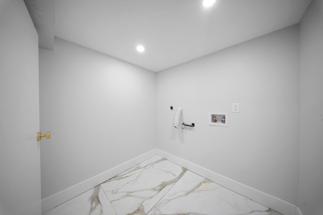 laundry area with laundry area, hookup for a washing machine, recessed lighting, and baseboards