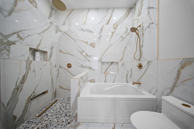 bathroom with marble finish floor, stone wall, toilet, and a combined bath / shower with marble appearance