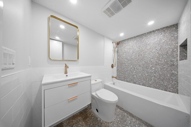 full bathroom featuring vanity, visible vents, recessed lighting, shower / bath combination, and toilet