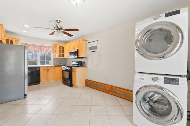 washroom with stacked washer and clothes dryer, recessed lighting, a ceiling fan, light tile patterned flooring, and laundry area