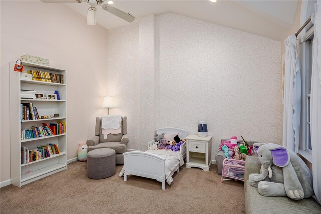 interior space with ceiling fan, baseboards, and carpet flooring