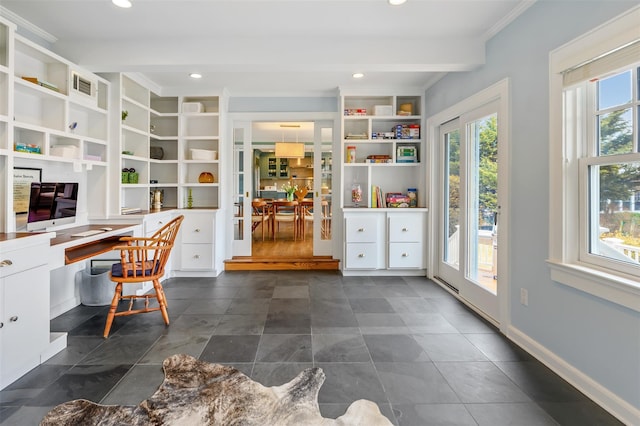 unfurnished office featuring recessed lighting, baseboards, built in study area, beam ceiling, and crown molding