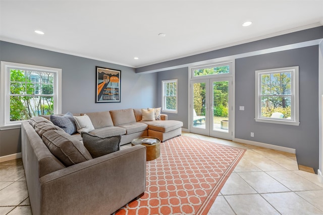 living room featuring light tile patterned floors, french doors, recessed lighting, and baseboards