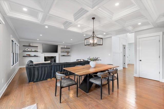 dining space with light wood-style flooring, coffered ceiling, beamed ceiling, and recessed lighting