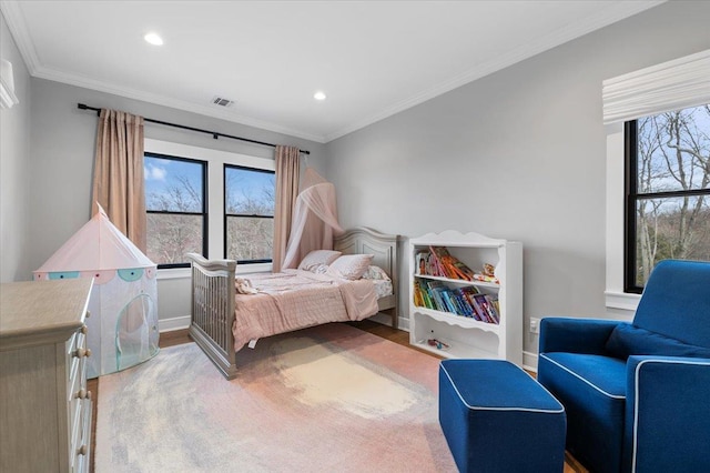 bedroom featuring recessed lighting, visible vents, ornamental molding, wood finished floors, and baseboards