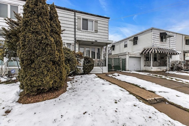 townhome / multi-family property featuring an attached garage