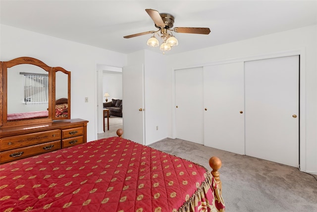 bedroom featuring a closet, carpet flooring, and a ceiling fan