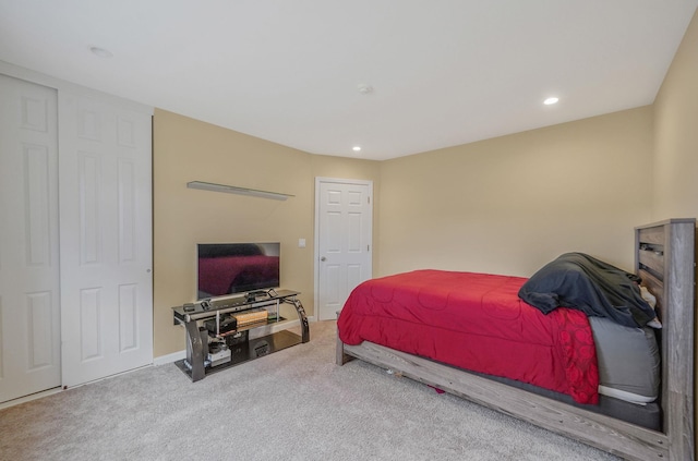 bedroom with recessed lighting, carpet flooring, and baseboards