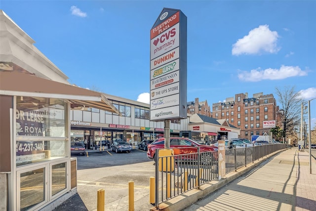 view of home's community featuring uncovered parking