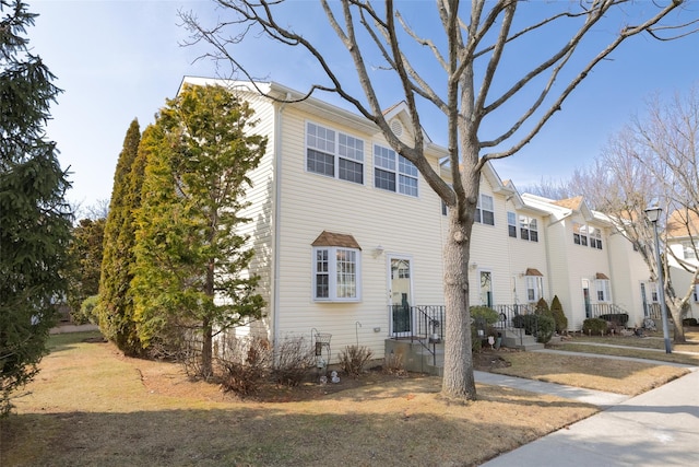 view of side of property with a residential view