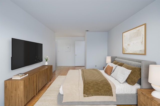 bedroom featuring light wood-type flooring