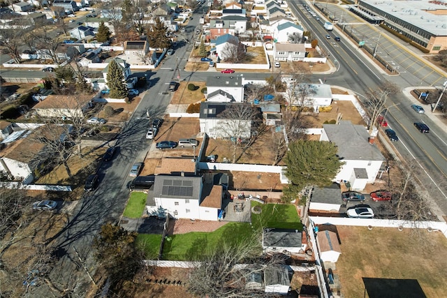 birds eye view of property with a residential view