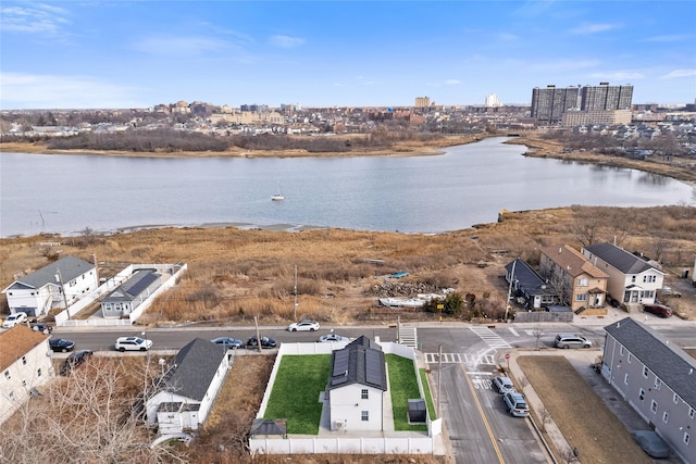 bird's eye view with a view of city and a water view