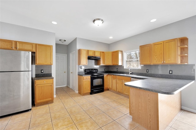 kitchen featuring under cabinet range hood, a peninsula, freestanding refrigerator, black electric range oven, and open shelves