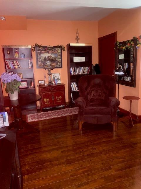 living area with wood finished floors