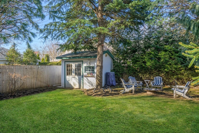 view of shed featuring a fenced backyard