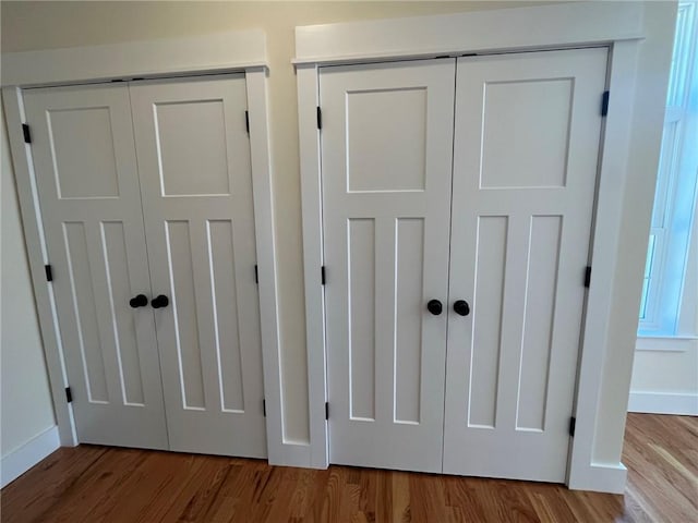 room details featuring wood finished floors and baseboards