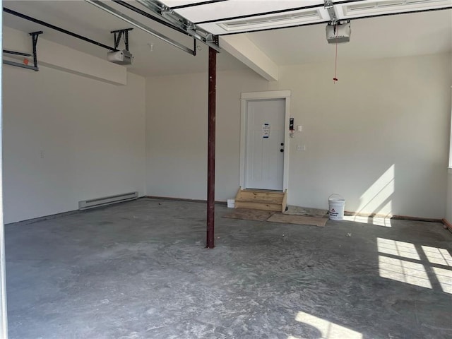 garage featuring a baseboard radiator and a garage door opener