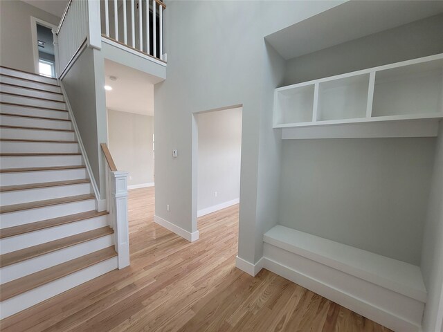 472 Wheeler Rd, Florida, NY 10921 - mudroom with baseboards, a high ceiling, and light wood finished floors