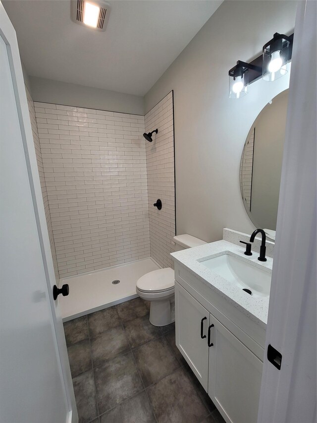 472 Wheeler Rd, Florida, NY 10921 - bathroom featuring toilet, visible vents, tiled shower, and vanity